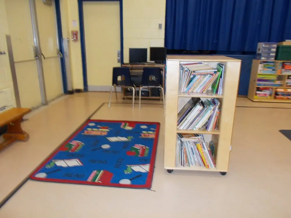 Bookshelf and play area of a preschool