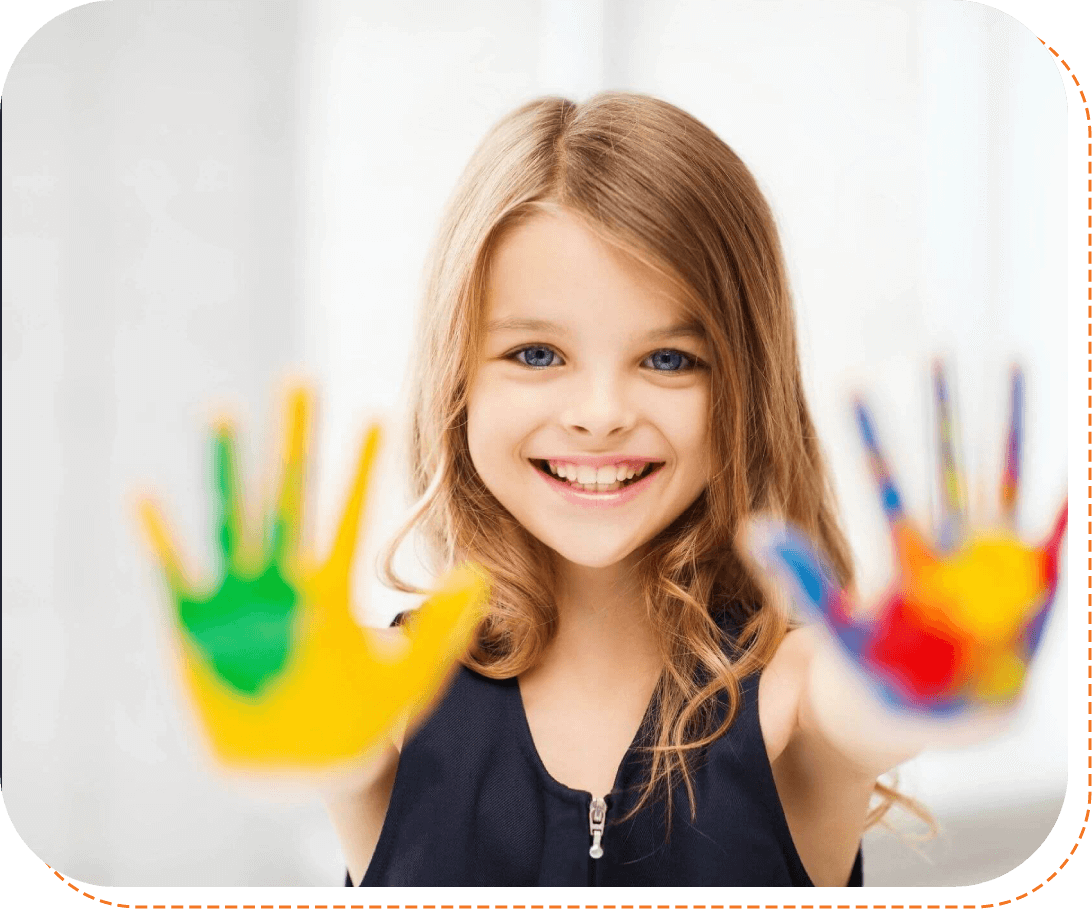 Happy girl with colors on her hand